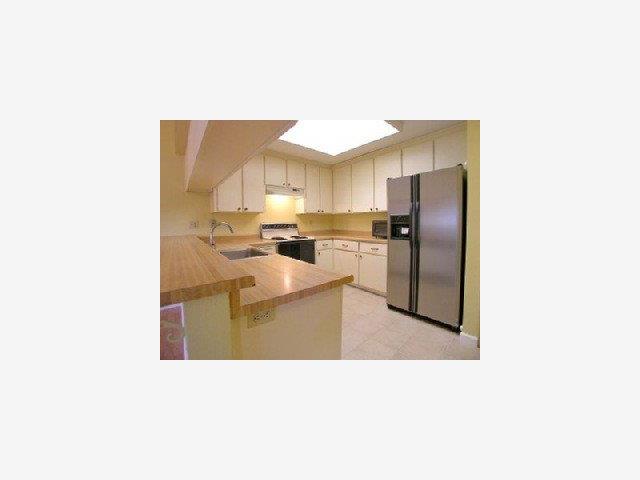 2206 Almaden Road, Unit B San Jose, CA 95125 - Photo 4 of 6 a upper view of a kitchen with a sink and refrigerator