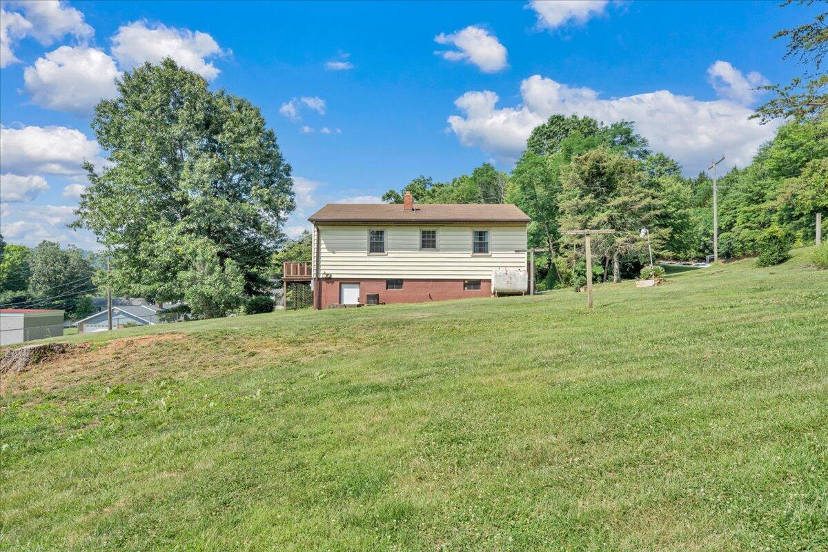 201 Long Avenue Covington, VA 24426 - Photo 35 of 43 a view of a house with a yard