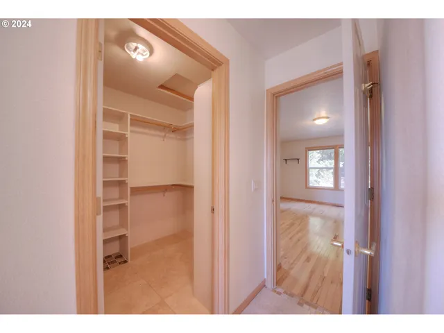 a picture of a bathroom with a toilet sink and mirror