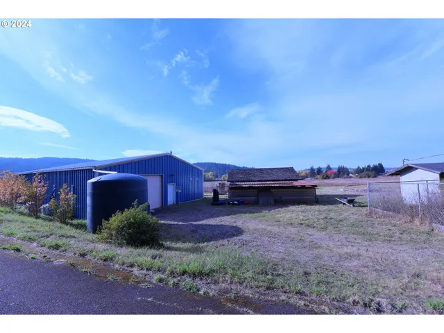 a view of a yard with an outdoor space