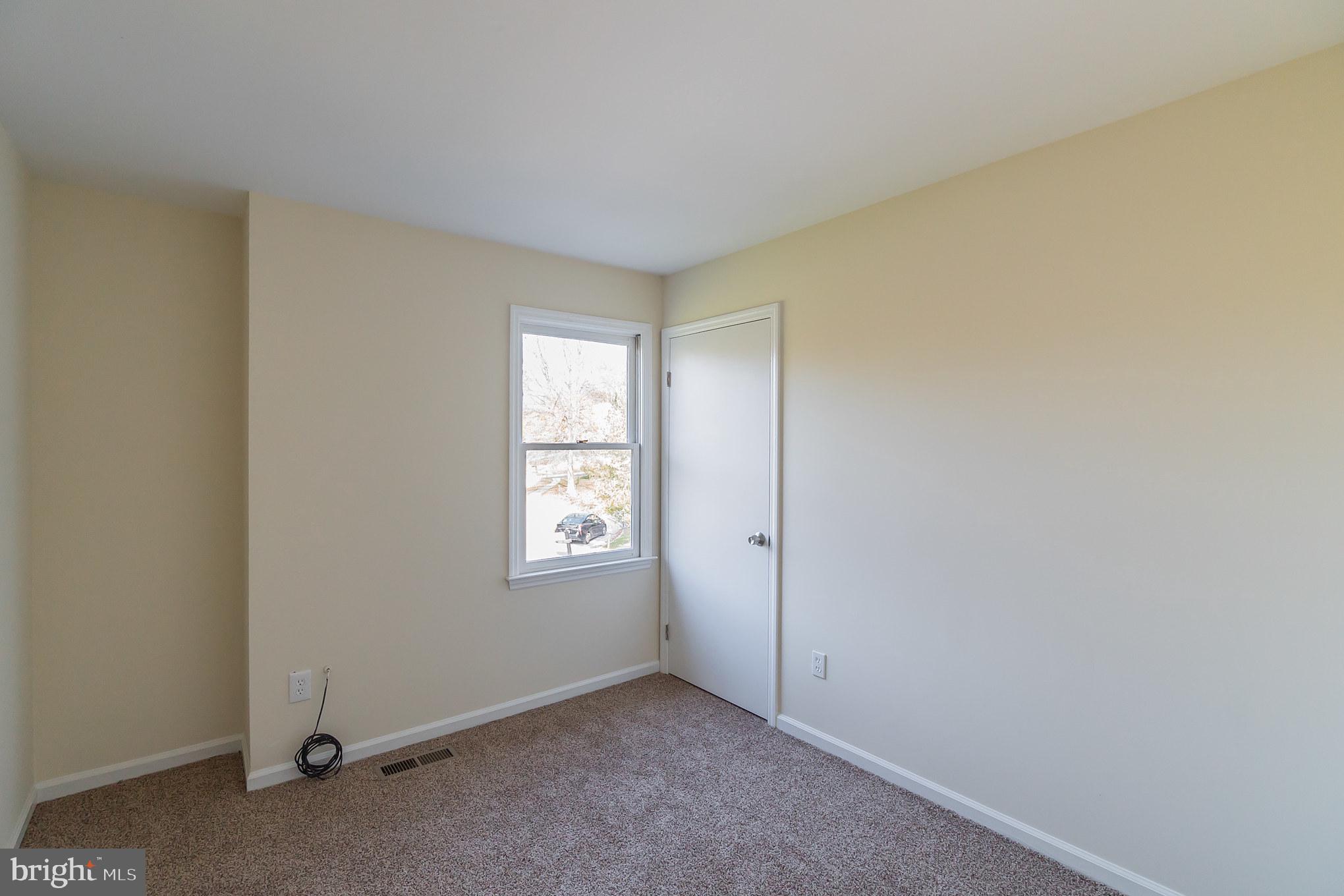 414 Windsor Circle Exton, PA 19341 - Photo 28 of 28 an empty room with windows