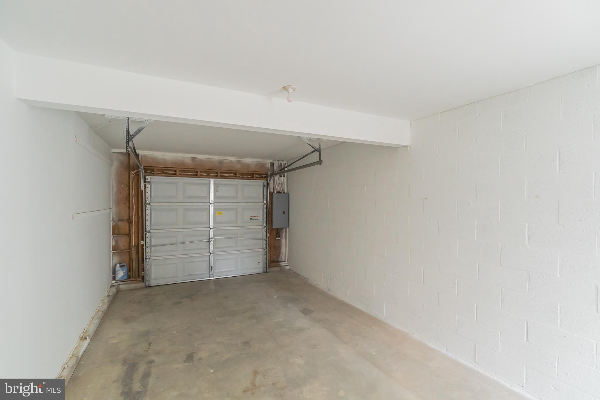 414 Windsor Circle Exton, PA 19341 - Photo 10 of 28 a view of an empty room and garage