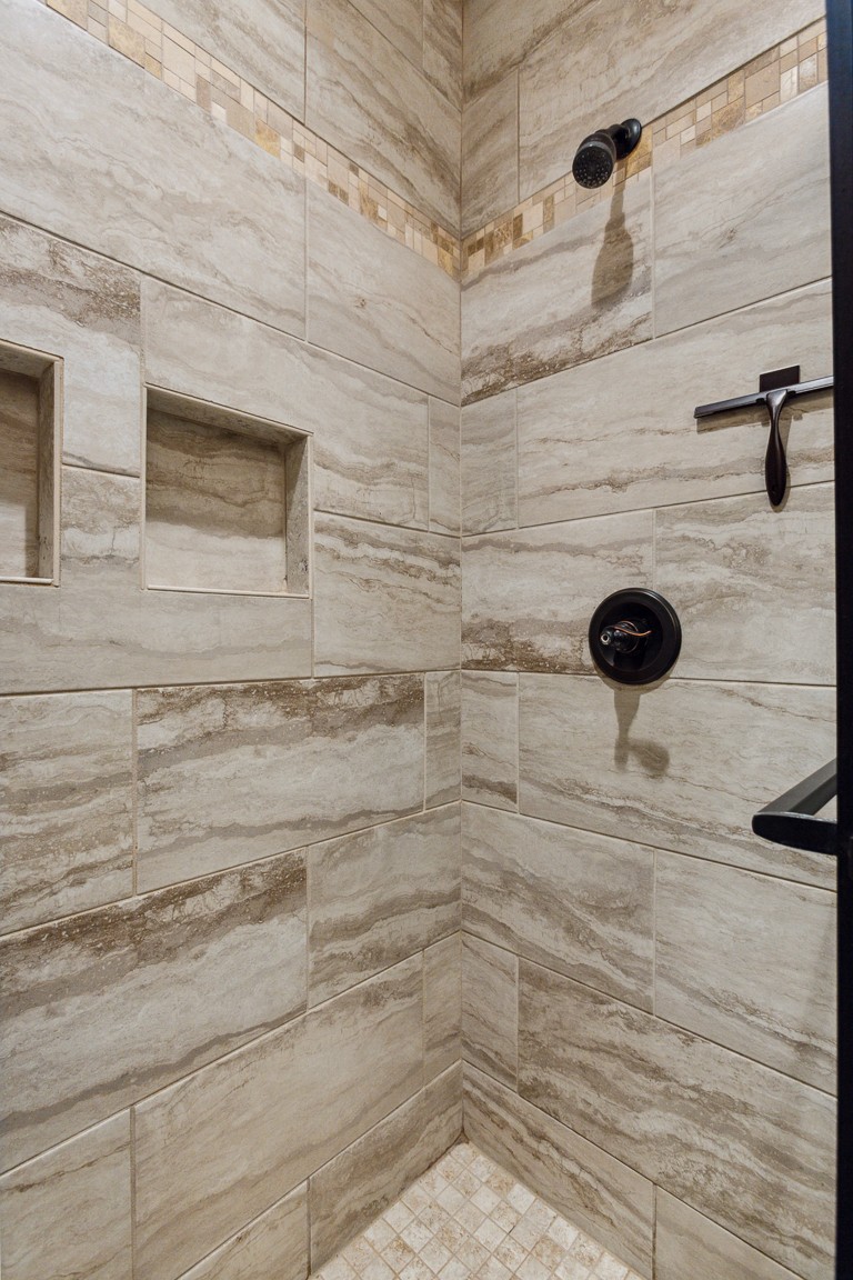 714 Pebble Point Road Lebanon, TN 37087 - Photo 28 of 45 a bathroom with a shower