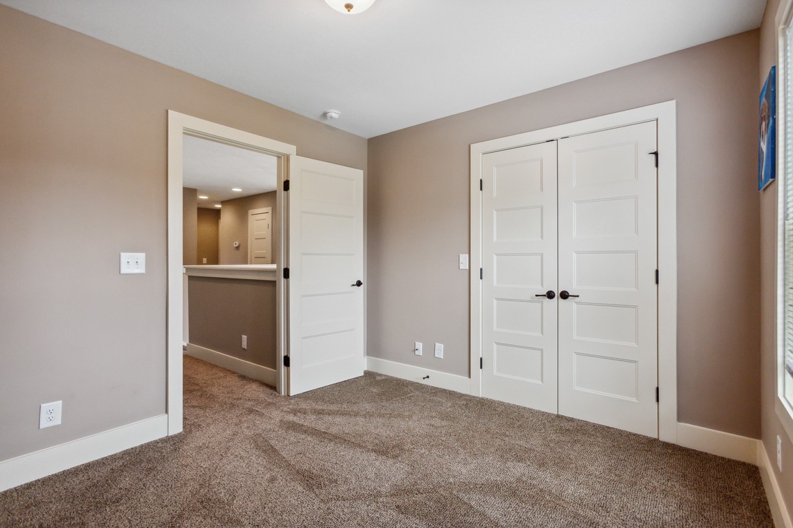 714 Pebble Point Road Lebanon, TN 37087 - Photo 32 of 45 an empty room with closet and a bathroom