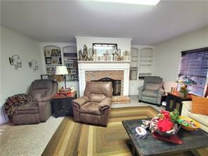 3459 Lickskillet Road Epworth, GA 30541 - Photo 3 of 26 a living room with furniture and a fireplace