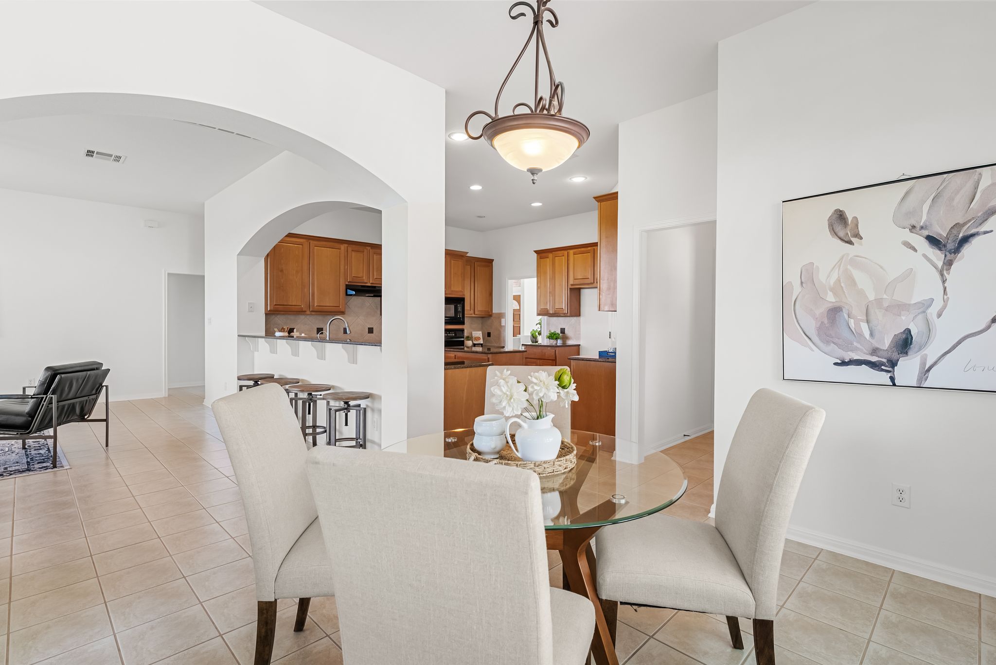 2708 Rio Mesa Drive Austin, TX 78732 - Photo 13 of 40 a living room with furniture and kitchen view
