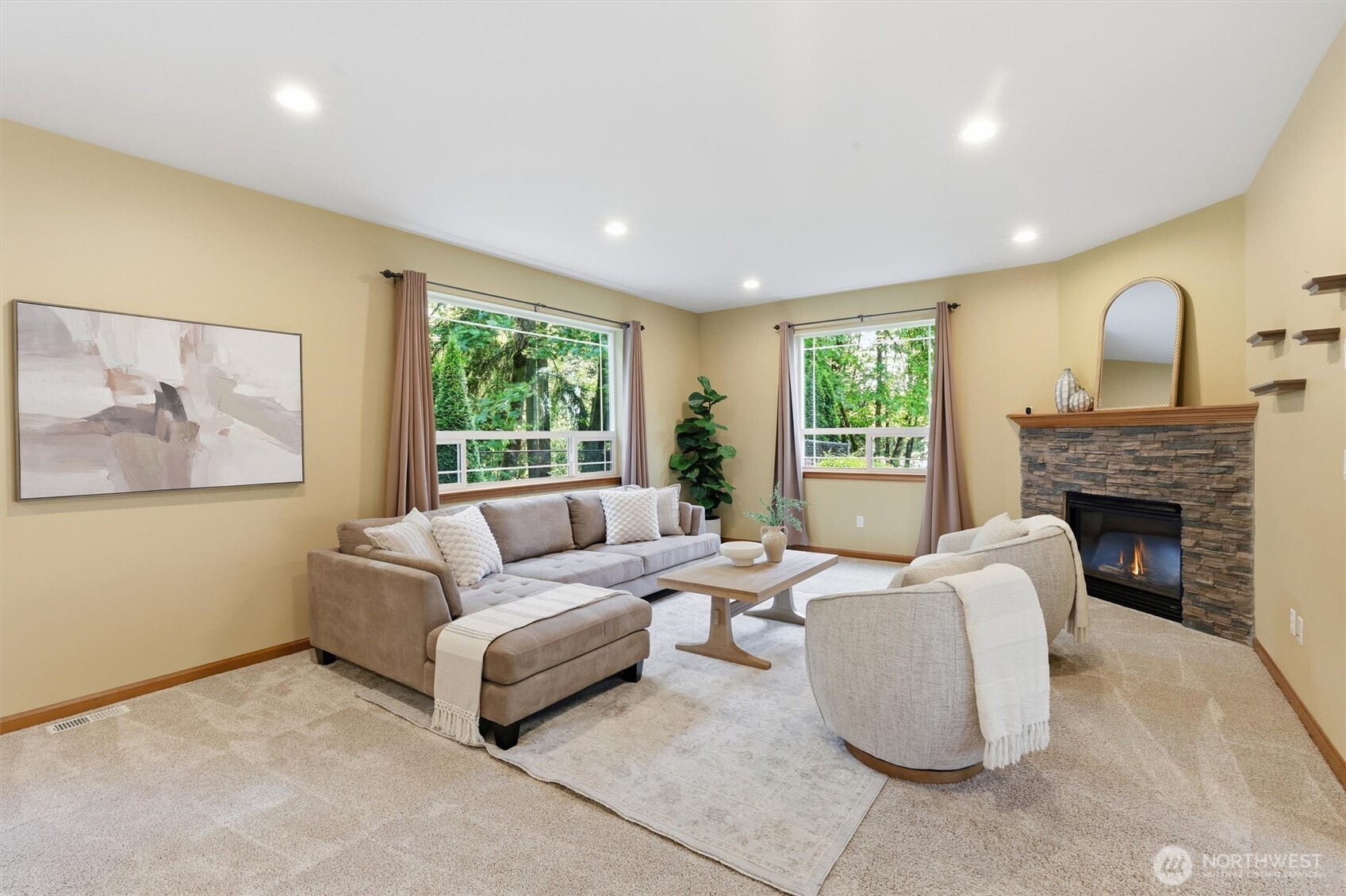 4202 Silvana Terrace Road Stanwood, WA 98292 - Photo 15 of 40 a living room with furniture and a fireplace