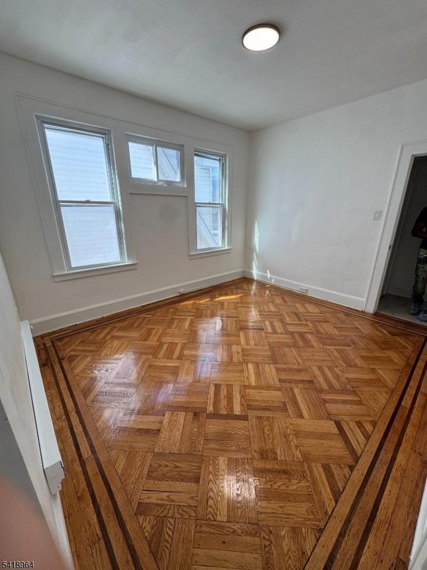 149 Brookside Avenue, Unit 2 Irvington, NJ 07111 - Photo 8 of 8 a view of an empty room