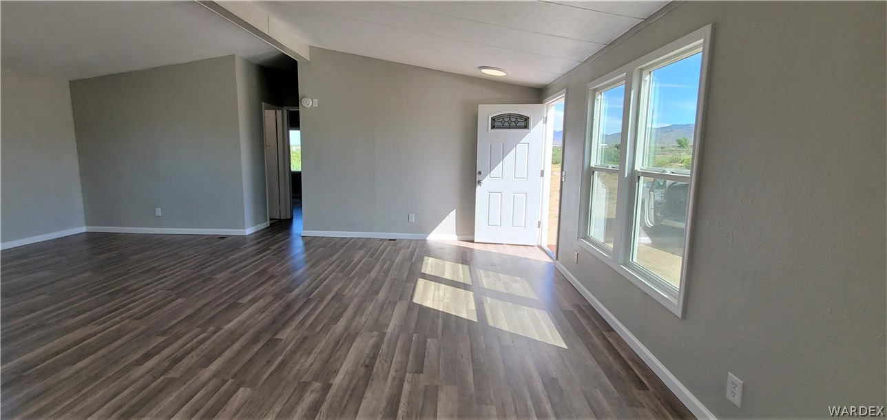 3841 North Avra Road Golden Valley, AZ 86413 - Photo 9 of 78 a view of hallway with wooden floor