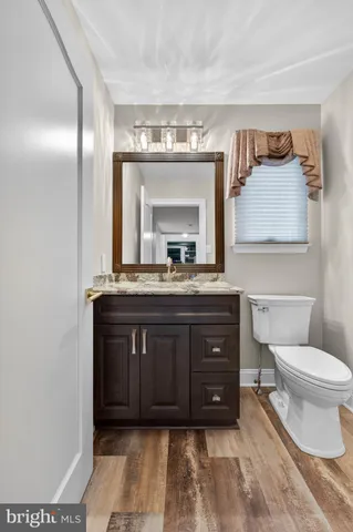 a bathroom with a sink and a toilet