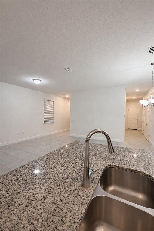 2237 Shadowland Loop Winter Park, FL 32792 - Photo 3 of 20 a close view of a sink and tap