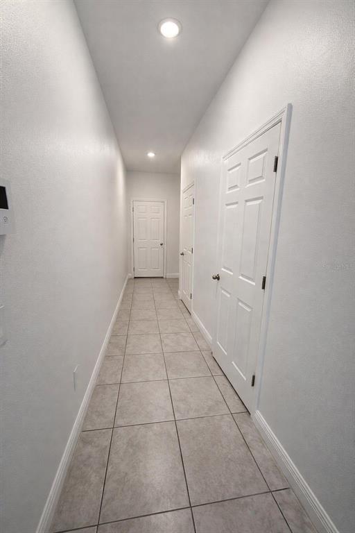 2237 Shadowland Loop Winter Park, FL 32792 - Photo 6 of 20 a view of hallway with a window