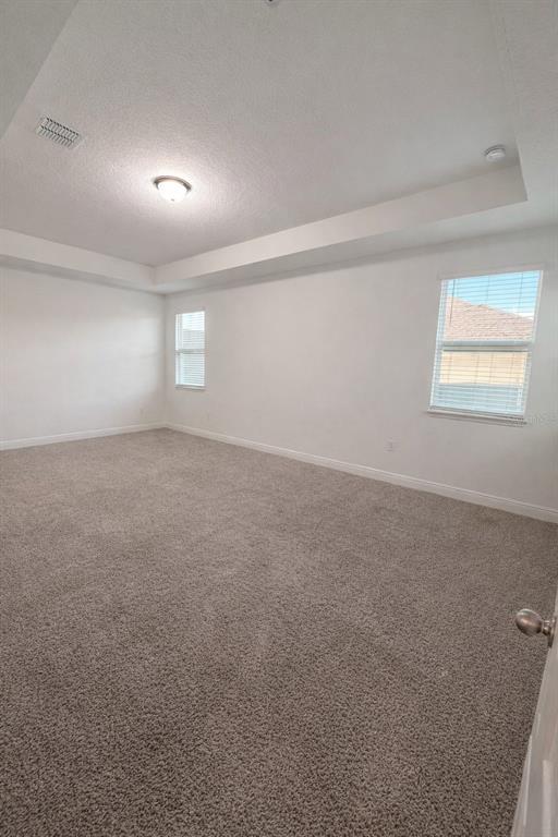 2237 Shadowland Loop Winter Park, FL 32792 - Photo 10 of 20 en empty room with windows