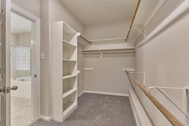 $565,000 | 7 Raindance Court, The Woodlands, TX 77385