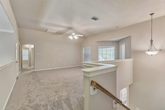 $565,000 | 7 Raindance Court, The Woodlands, TX 77385