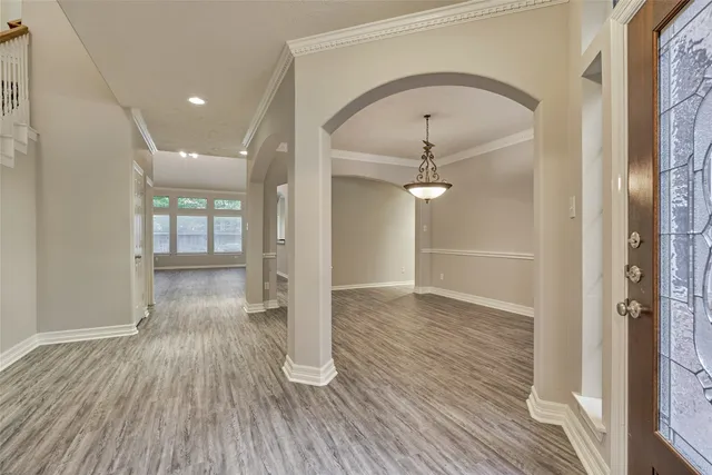 $565,000 | 7 Raindance Court, The Woodlands, TX 77385