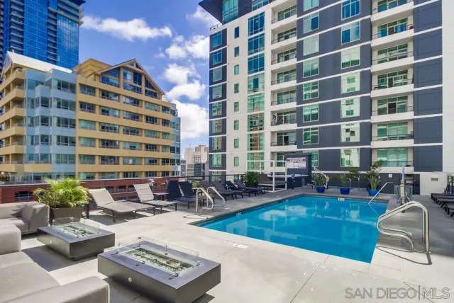 a view of store room with furniture and a kitchen