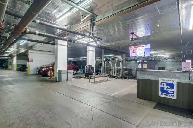 a view of parking garage with cars