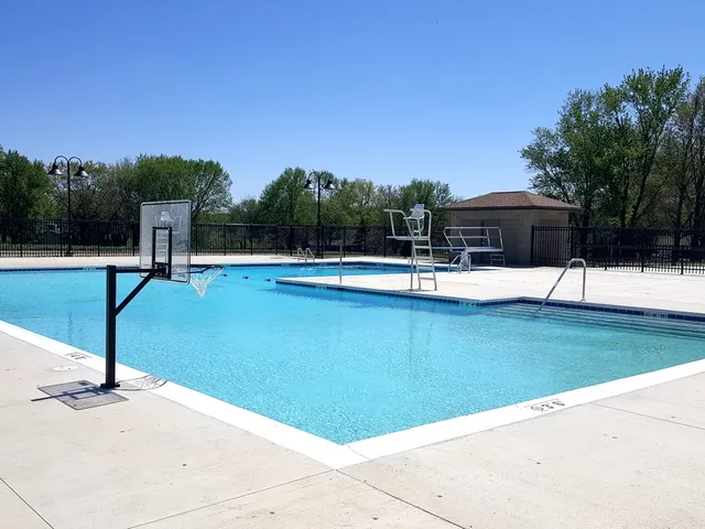 a view of a house with a swimming pool