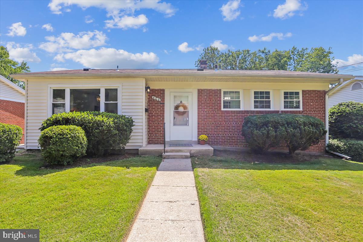 406 Waterford Road Silver Spring, MD 20901 - Photo 1 of 42 a front view of house with yard and outdoor seating