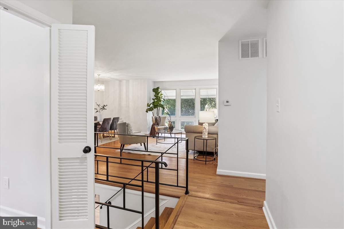 406 Waterford Road Silver Spring, MD 20901 - Photo 7 of 42 a workspace room with wooden floor and windows