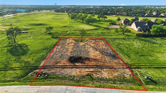 a view of a yard with an outdoor space