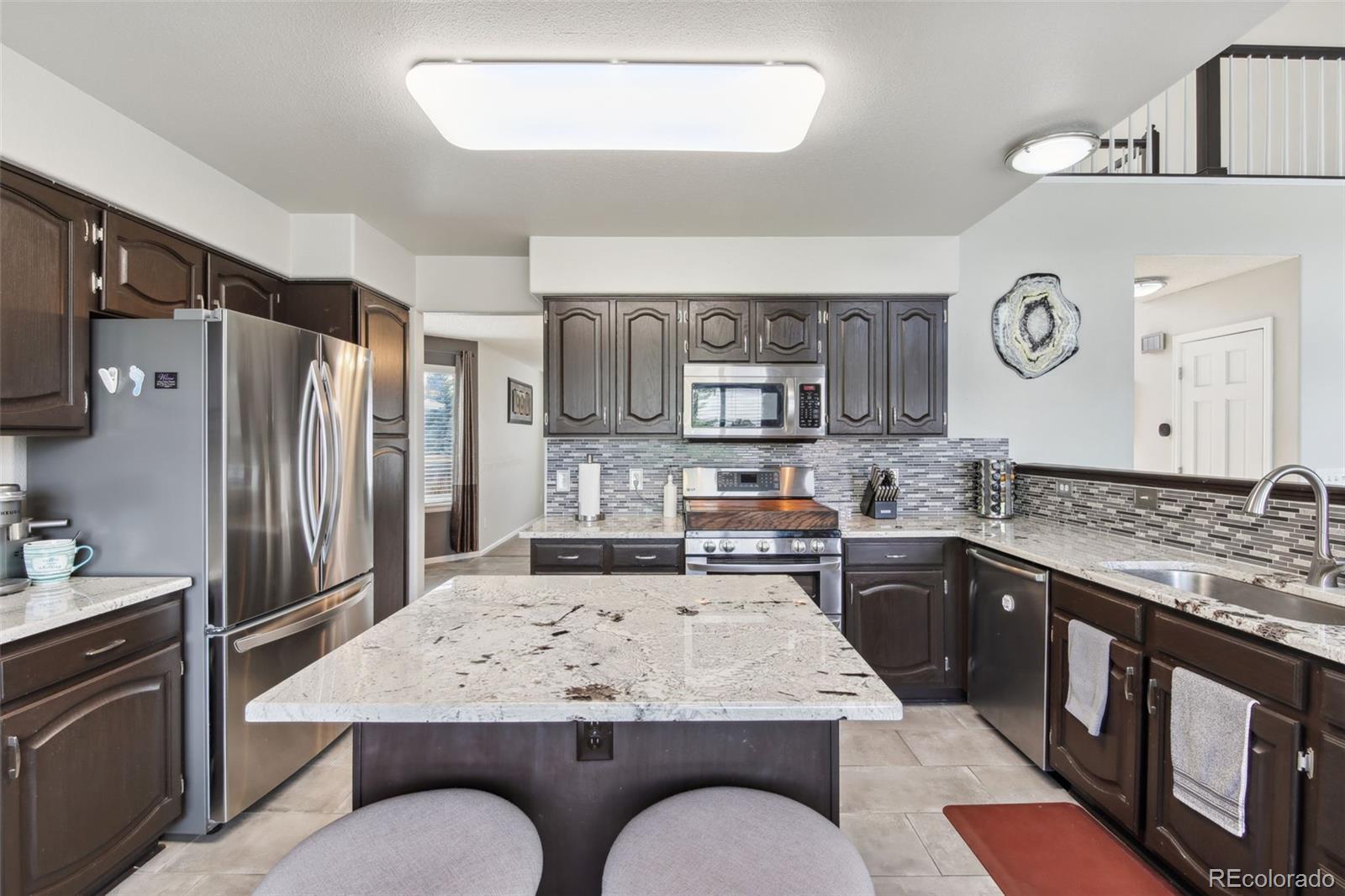 9954 Silver Maple Way Highlands Ranch, CO 80129 - Photo 2 of 21 Gallery Image 2