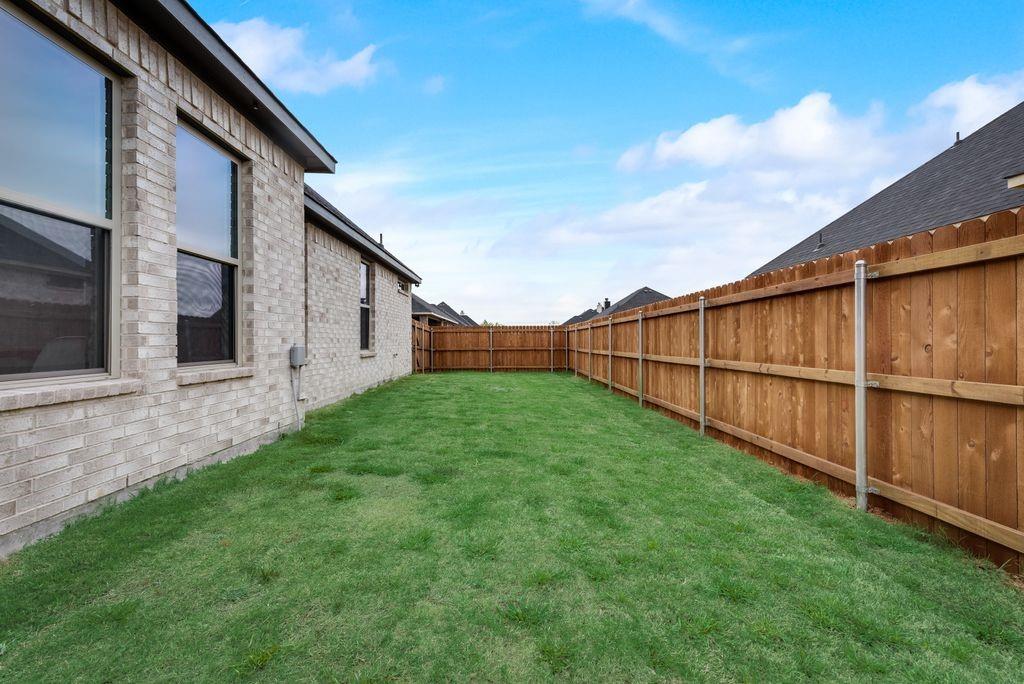 125 Katalina Lane Waxahachie, TX 75165 - Photo 3 of 34 a view of backyard with garden