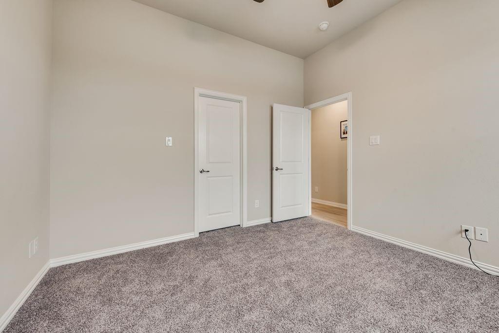 125 Katalina Lane Waxahachie, TX 75165 - Photo 31 of 34 an empty room with an entryway