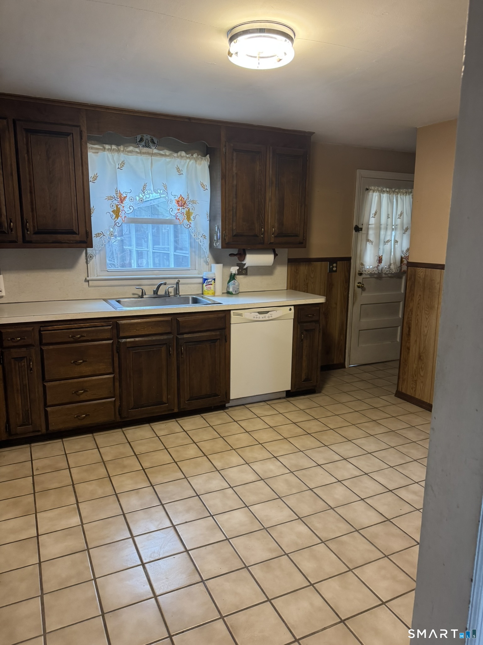 111 Harvard Street Hartford, CT 06106 - Photo 17 of 21 a kitchen with stainless steel appliances granite countertop a sink and cabinets