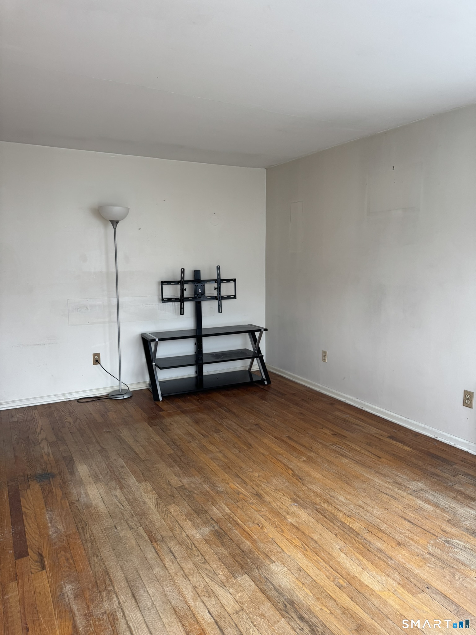 111 Harvard Street Hartford, CT 06106 - Photo 20 of 21 a view of a room with wooden floor