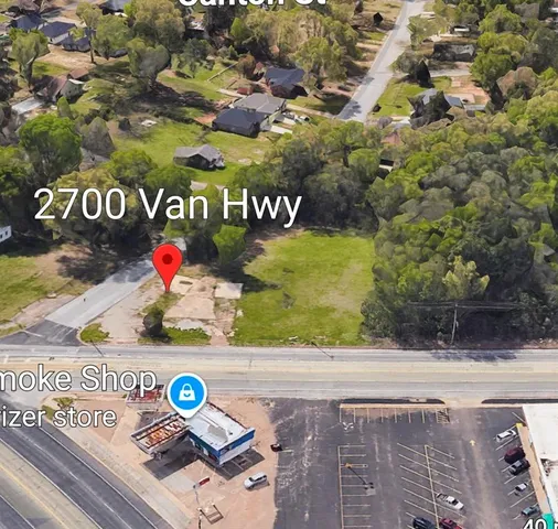 a view of outdoor space with deck and yard