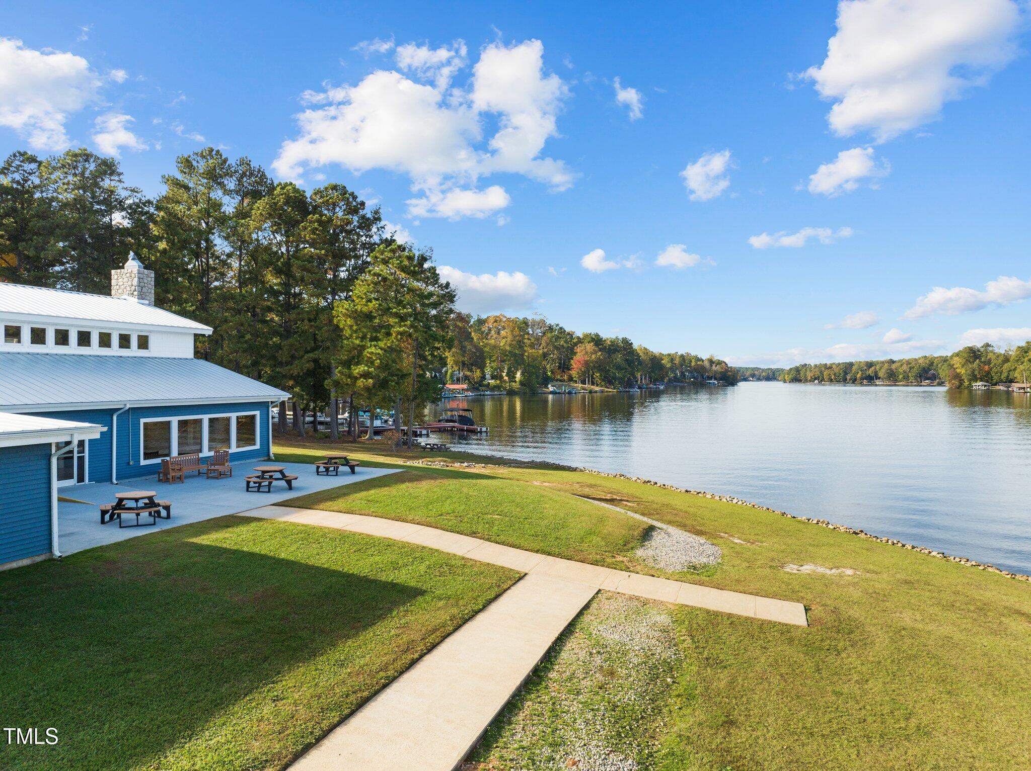 123 Catoose Drive Spring Hope, NC 27882 - Photo 22 of 38 a view of a house with pool and lake view