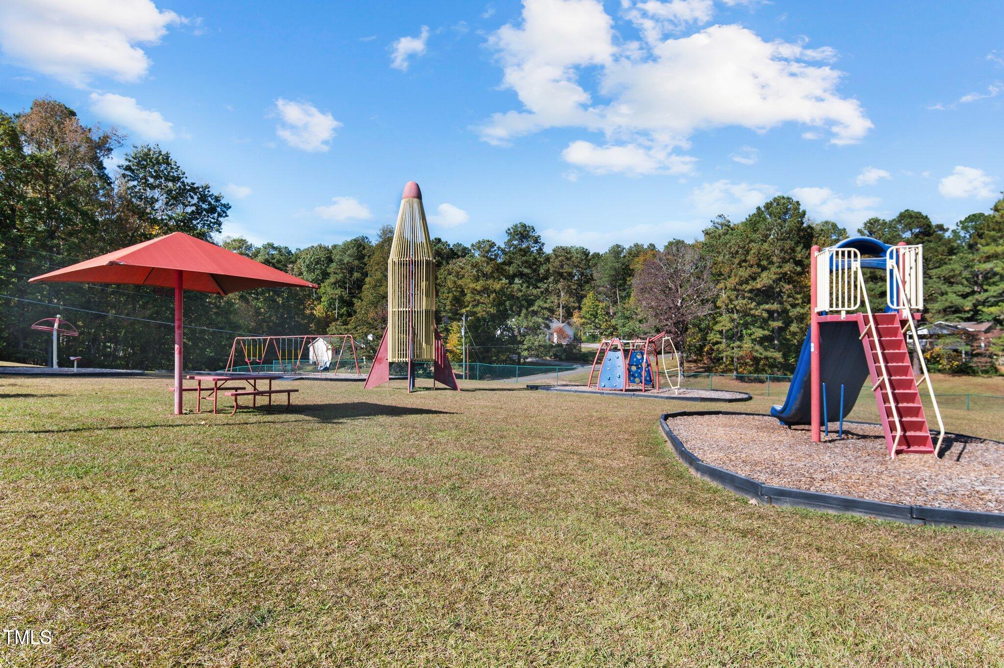 123 Catoose Drive Spring Hope, NC 27882 - Photo 29 of 38 a view of a swimming pool with sitting area and furniture