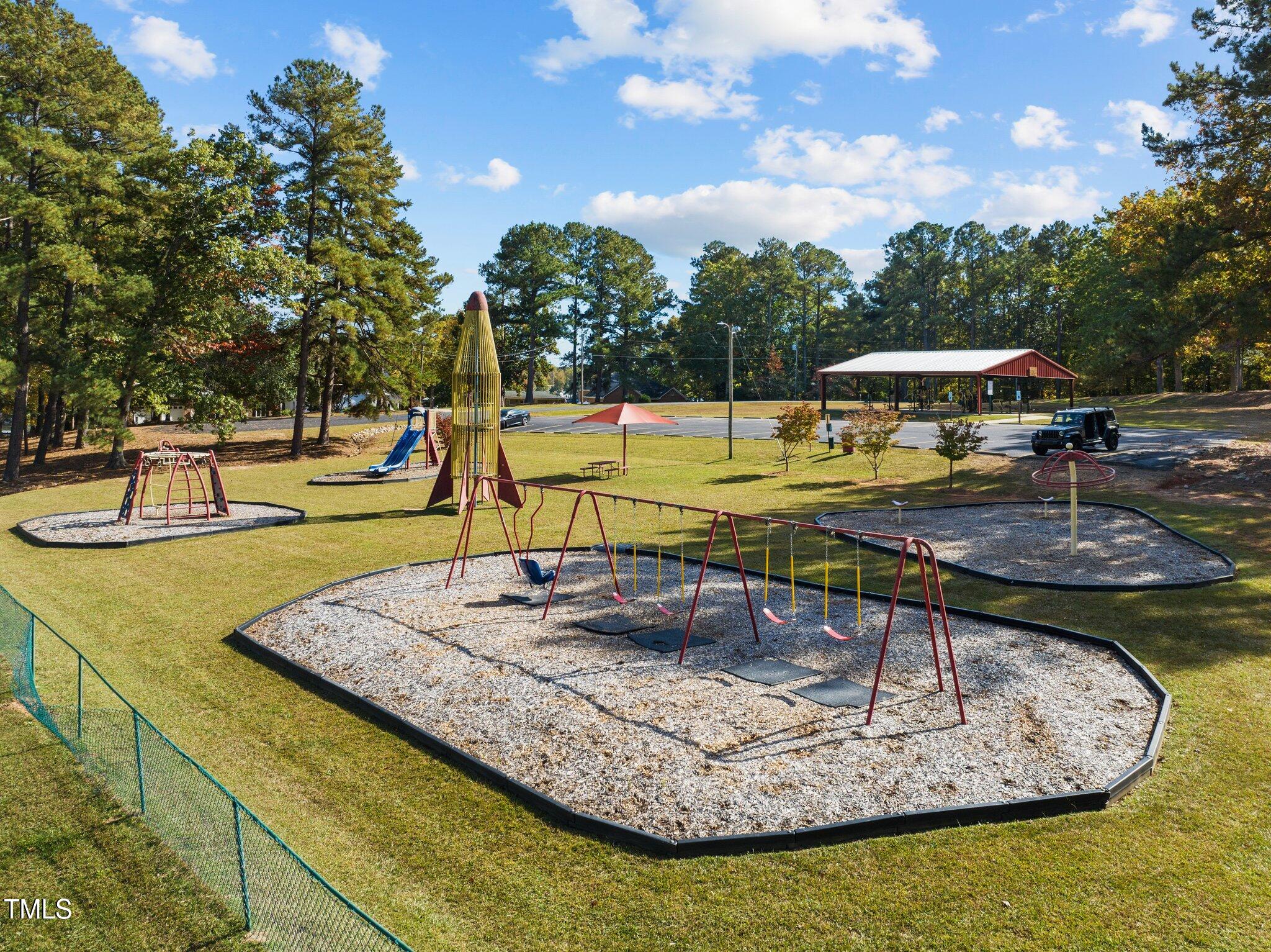 123 Catoose Drive Spring Hope, NC 27882 - Photo 30 of 38 a view of a swimming pool with a patio
