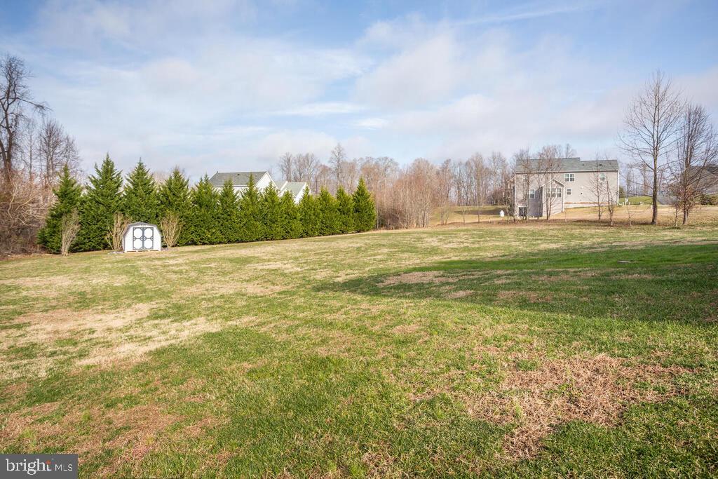 2009 Baythorne Road Prince Frederick, MD 20678 - Photo 22 of 39 Rear flat yard with Shed