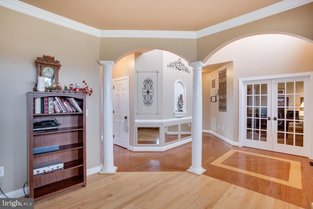 2009 Baythorne Road Prince Frederick, MD 20678 - Photo 27 of 39 Living Room w/Crown Molding opened to Foyer