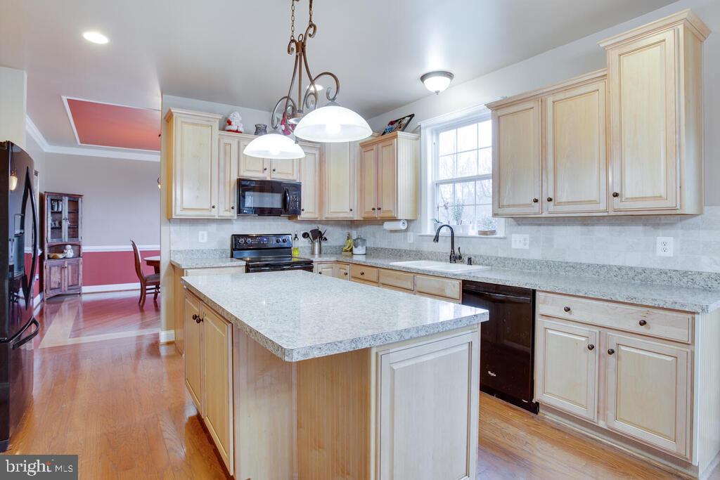 2009 Baythorne Road Prince Frederick, MD 20678 - Photo 4 of 39 Large Kitchen with Breakfast Bar Island