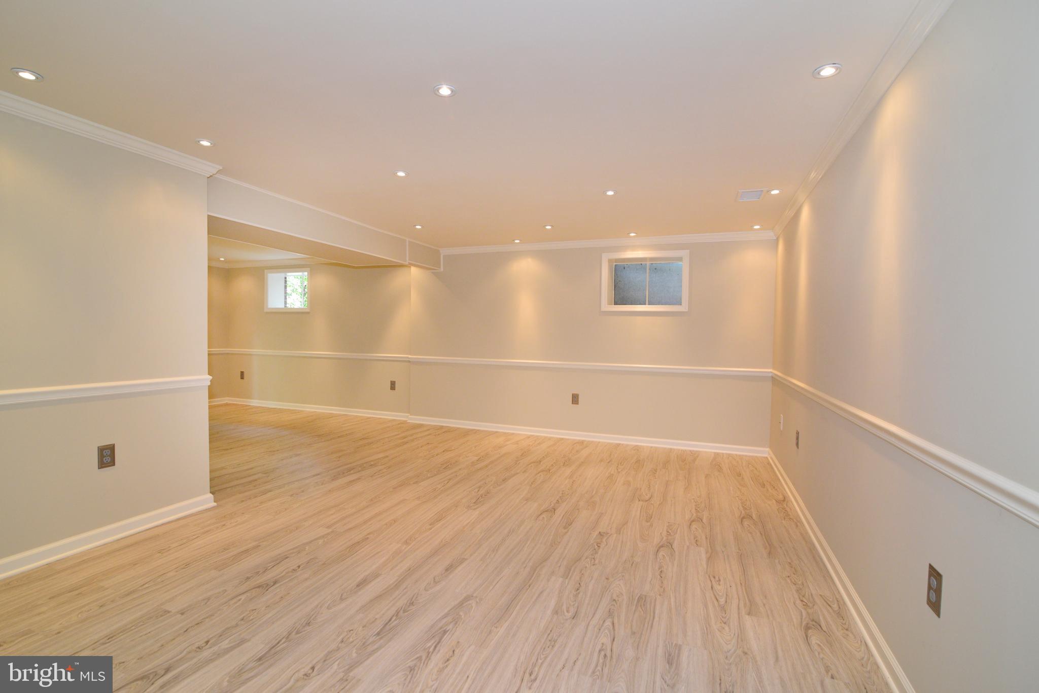 11480 Bingham Terrace Reston, VA 20191 - Photo 37 of 48 Spacious & bright Lower Level with recessed light!