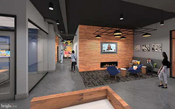 a lobby with furniture and window