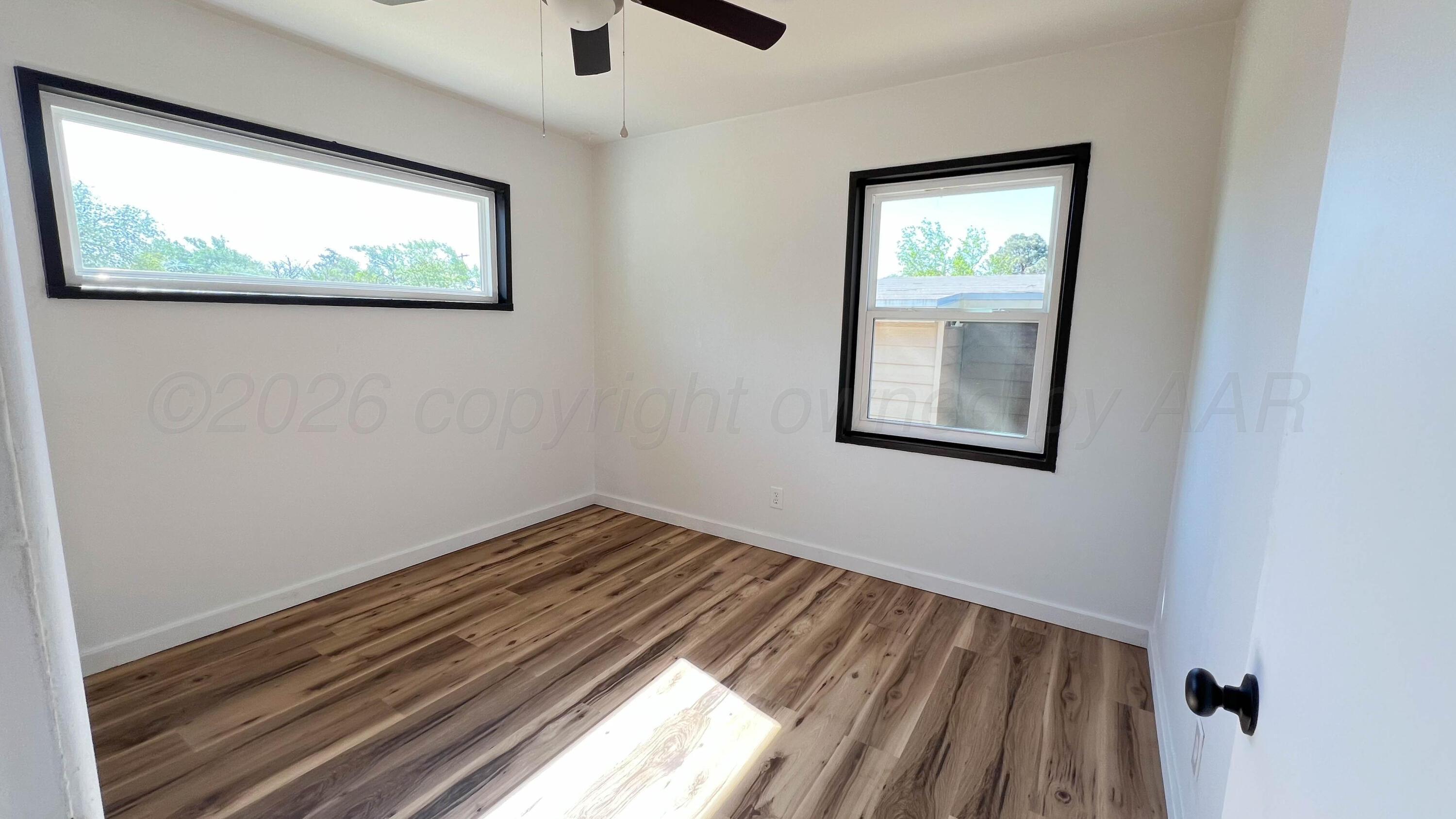 4410 South Ong Street Amarillo, TX 79110 - Photo 10 of 22 a view of empty room with window