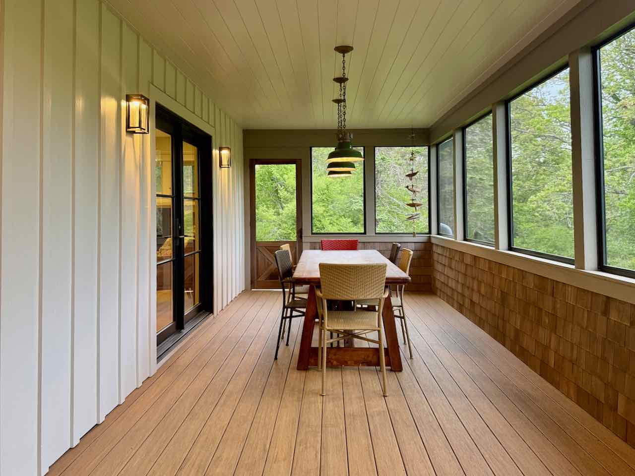 60 Meetinghouse Road Chilmark, MA 02535 - Photo 27 of 49 a view of a dining room with furniture window and wooden floor