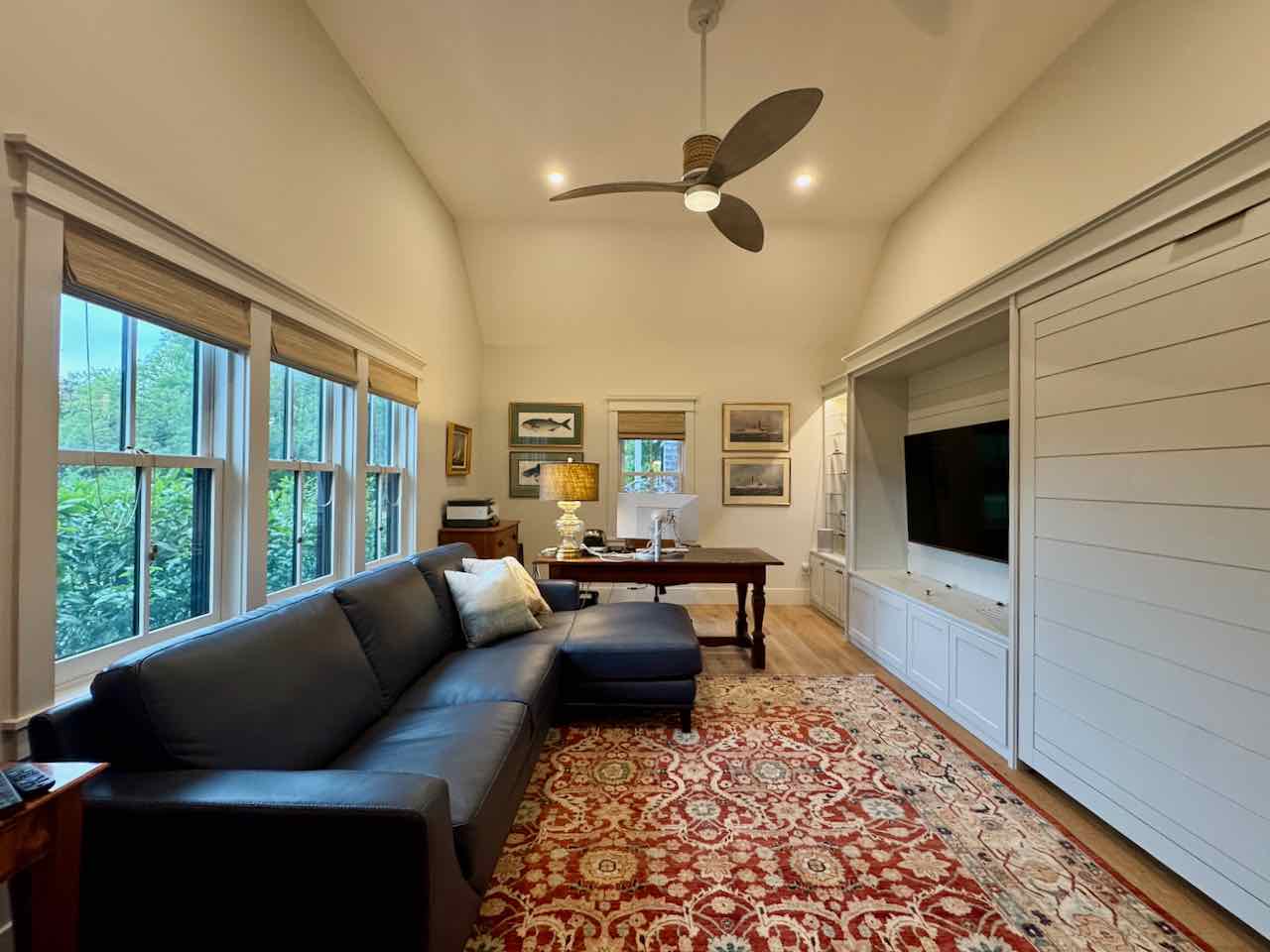 60 Meetinghouse Road Chilmark, MA 02535 - Photo 30 of 49 a living room with furniture and a flat screen tv