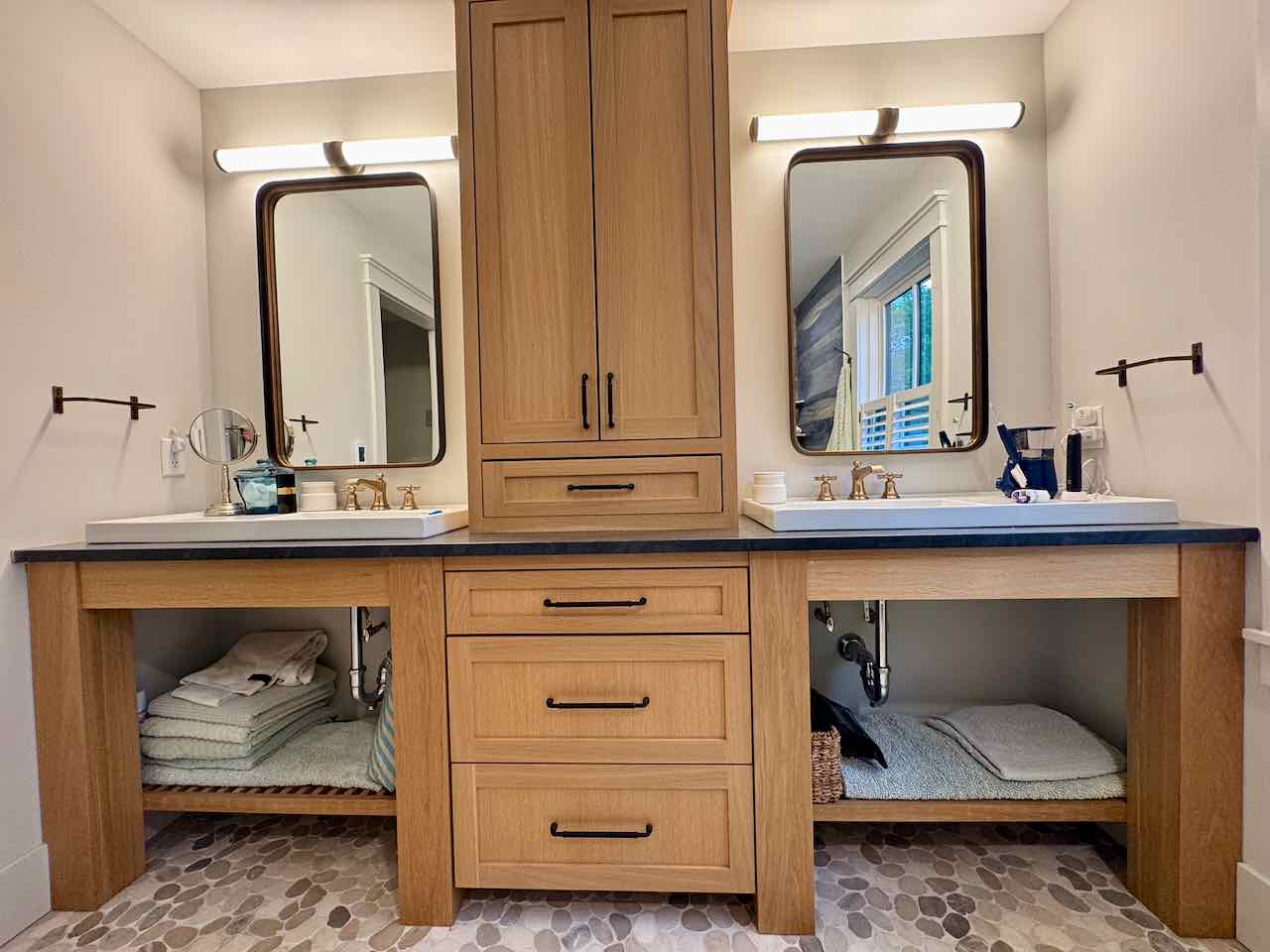 60 Meetinghouse Road Chilmark, MA 02535 - Photo 33 of 49 a bathroom with a sink and a mirror
