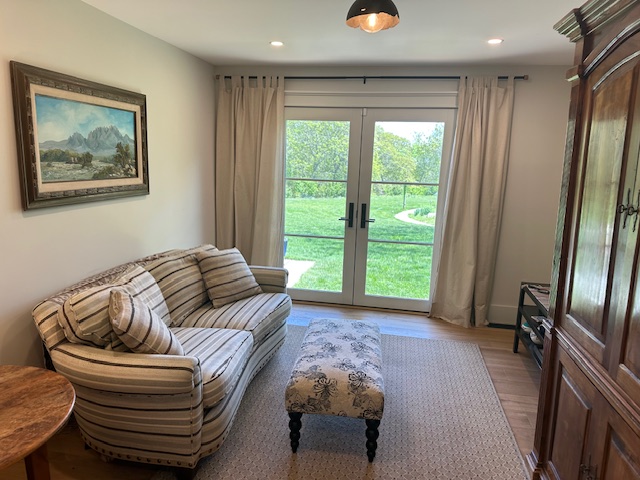 60 Meetinghouse Road Chilmark, MA 02535 - Photo 35 of 49 a bedroom with furniture and a large window