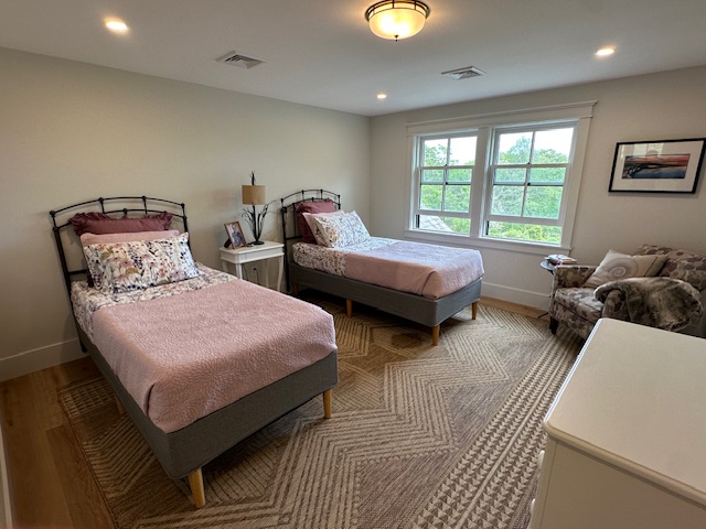 60 Meetinghouse Road Chilmark, MA 02535 - Photo 37 of 49 a bedroom with two beds and a large window