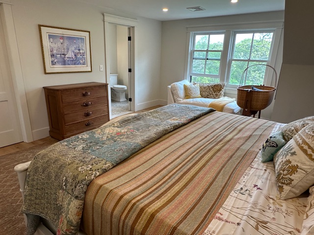 60 Meetinghouse Road Chilmark, MA 02535 - Photo 40 of 49 a bedroom with a bed and a large window