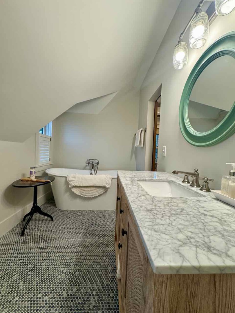 60 Meetinghouse Road Chilmark, MA 02535 - Photo 41 of 49 a bathroom with a granite countertop sink and a mirror