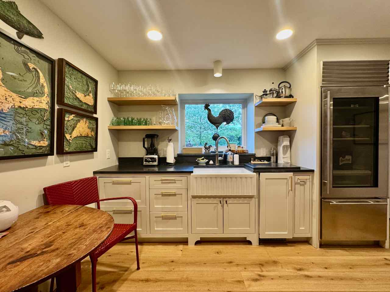 60 Meetinghouse Road Chilmark, MA 02535 - Photo 44 of 49 a kitchen with stainless steel appliances granite countertop a stove a sink and a refrigerator