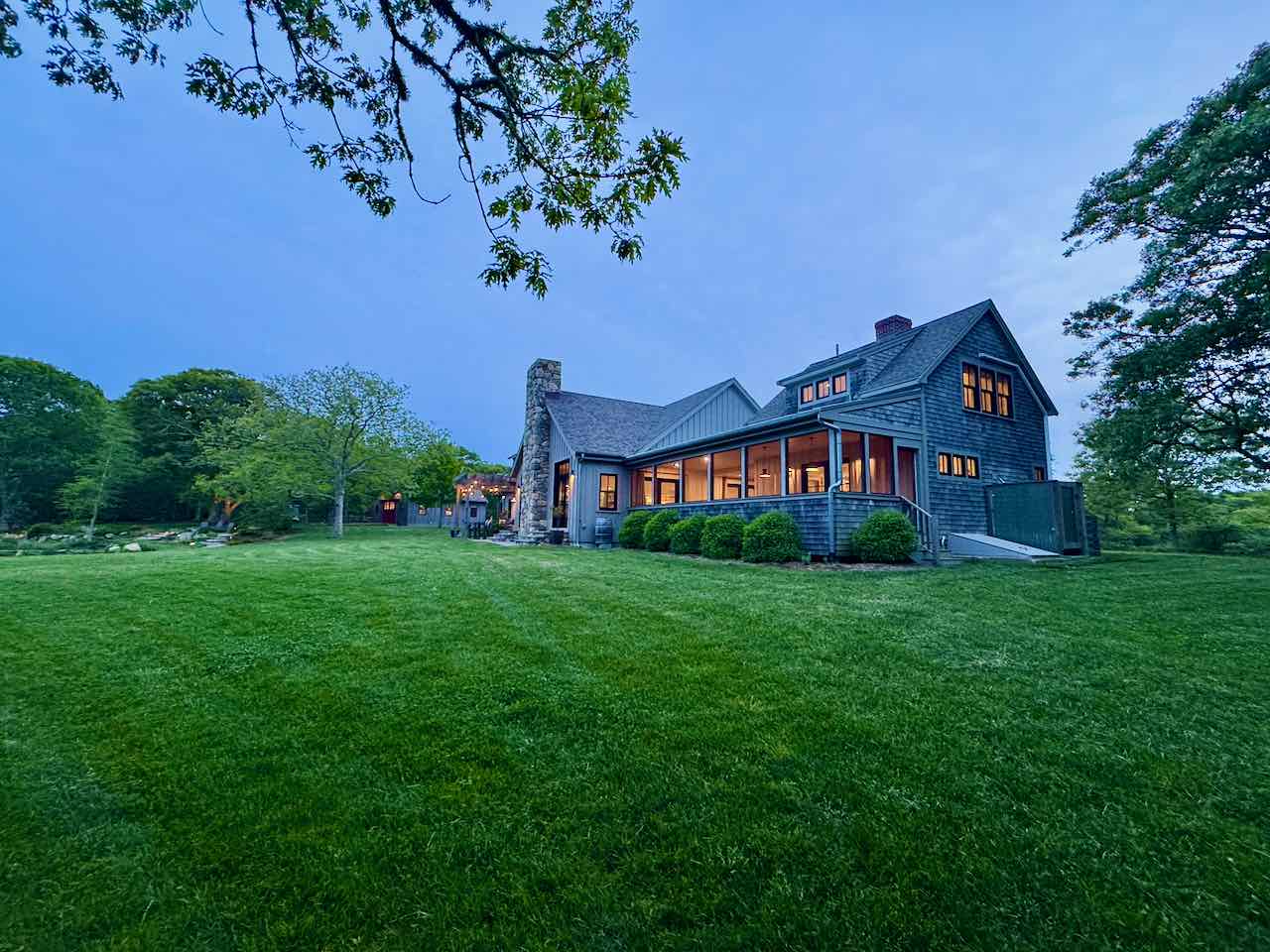 60 Meetinghouse Road Chilmark, MA 02535 - Photo 8 of 49 a view of a big house with a big yard
